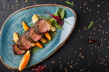 Gegrilde eendenborst met portsaus en sinaasappel